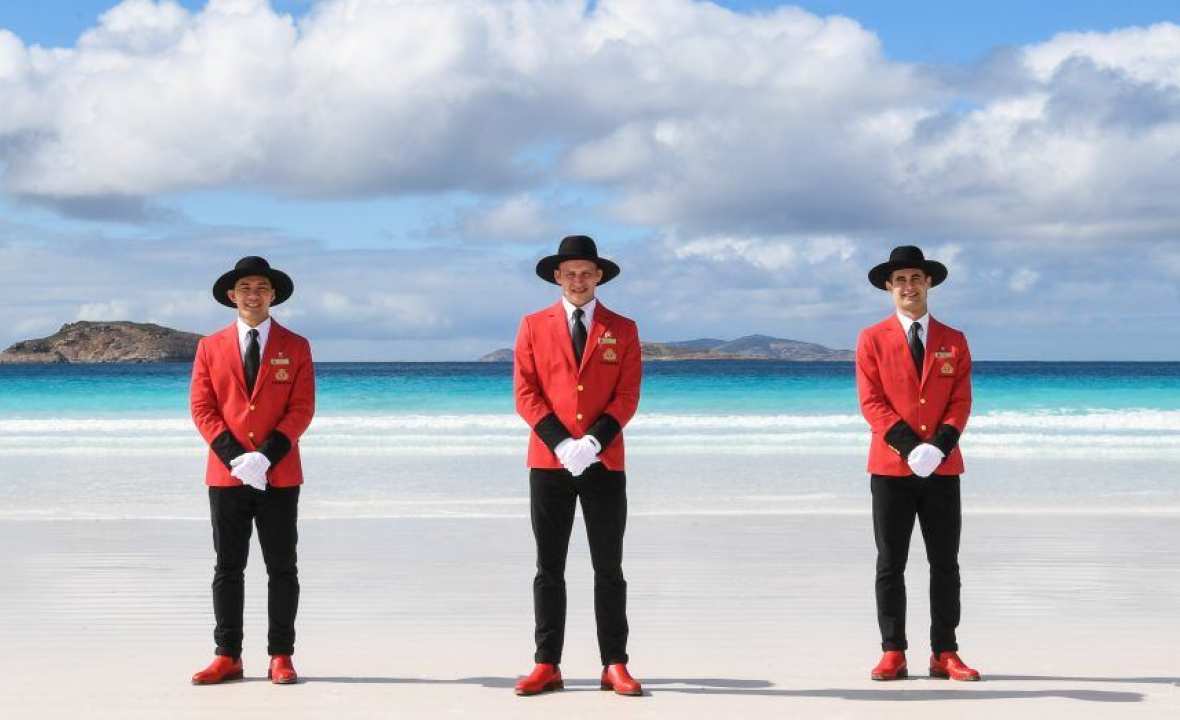 cunard-bellboys-on-a-beach-in-australia