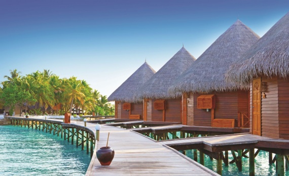 Maldives-Huts-Boardwalk-ocean-shutterstock-romantic-getaway-retreat-relax