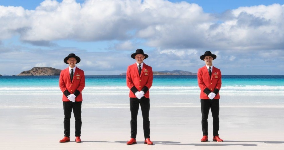 cunard-bellboys-on-a-beach-in-australia