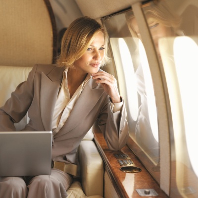 Phil-Hoffmann-Business-Travel-business-woman-plane